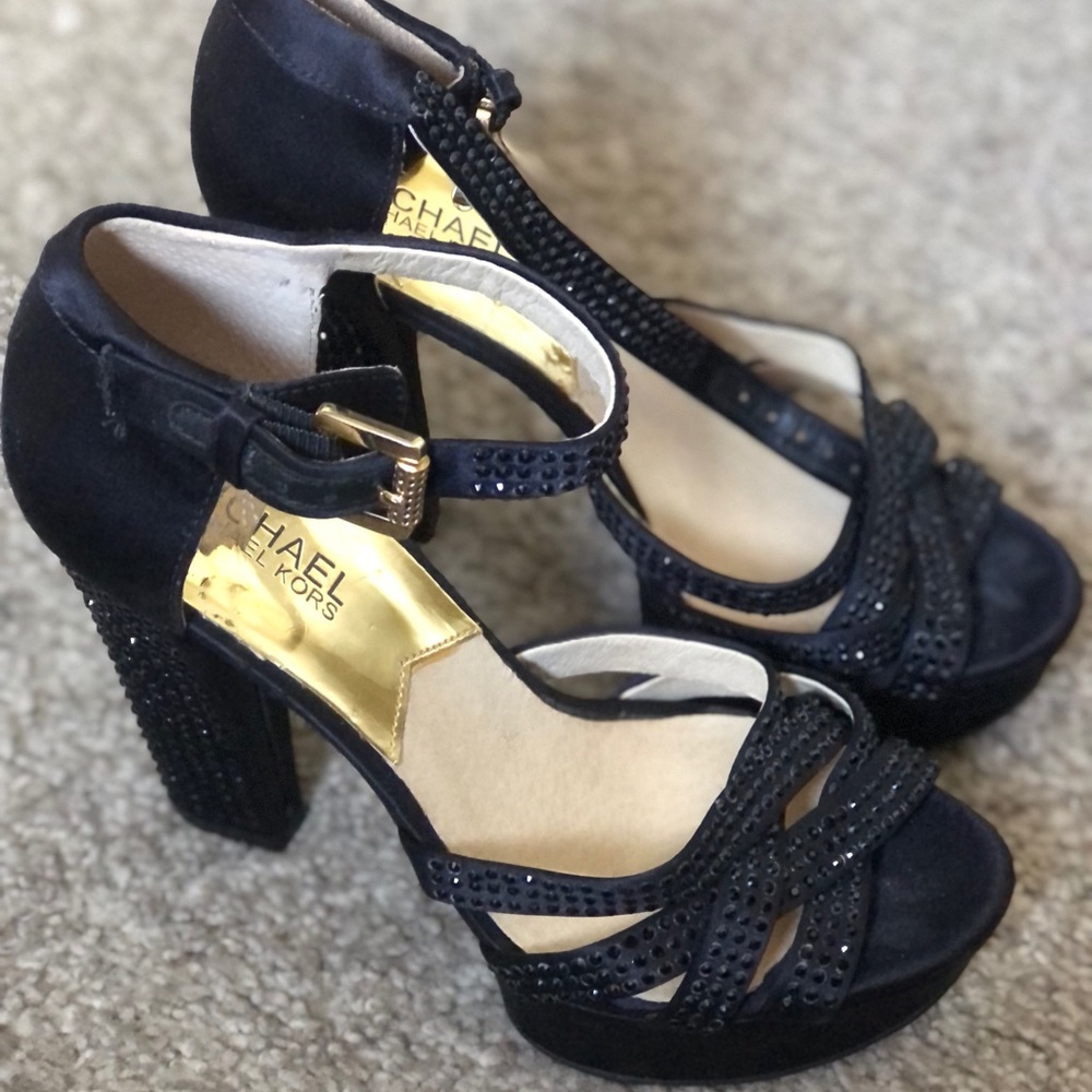 Michael kors size 7/1/2 slightly used
